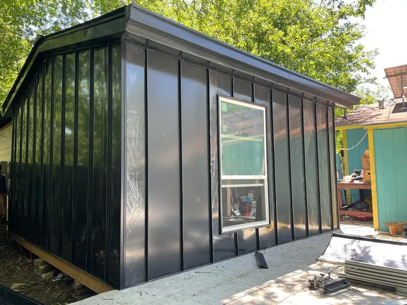 Black standing seam metal wall panels for Roof Inspection in Dillon